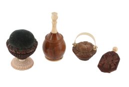 Four coquilla nut and bone or ivory items, mainly early 19th century  Four coquilla nut and bone