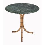 A serpentine marble mounted cast iron tripod table , circa 1880 and later  A serpentine marble
