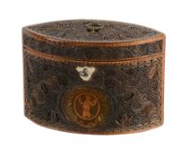 A George III paperscroll decorated pine tea caddy, late 18th cntury  A George III paperscroll