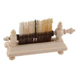 A Regency turned ivory table top gaming recorder, circa 1820  A Regency turned ivory table top
