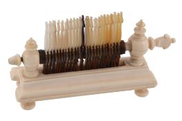 A Regency turned ivory table top gaming recorder, circa 1820  A Regency turned ivory table top