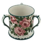 A Wemyss medium tyg or loving cup, circa 1900 , painted with pink roses  A Wemyss medium tyg or