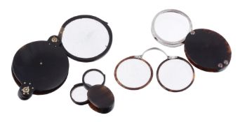 A George IV tortoiseshell and white alloy oval folding pince nez case  A George IV tortoiseshell and