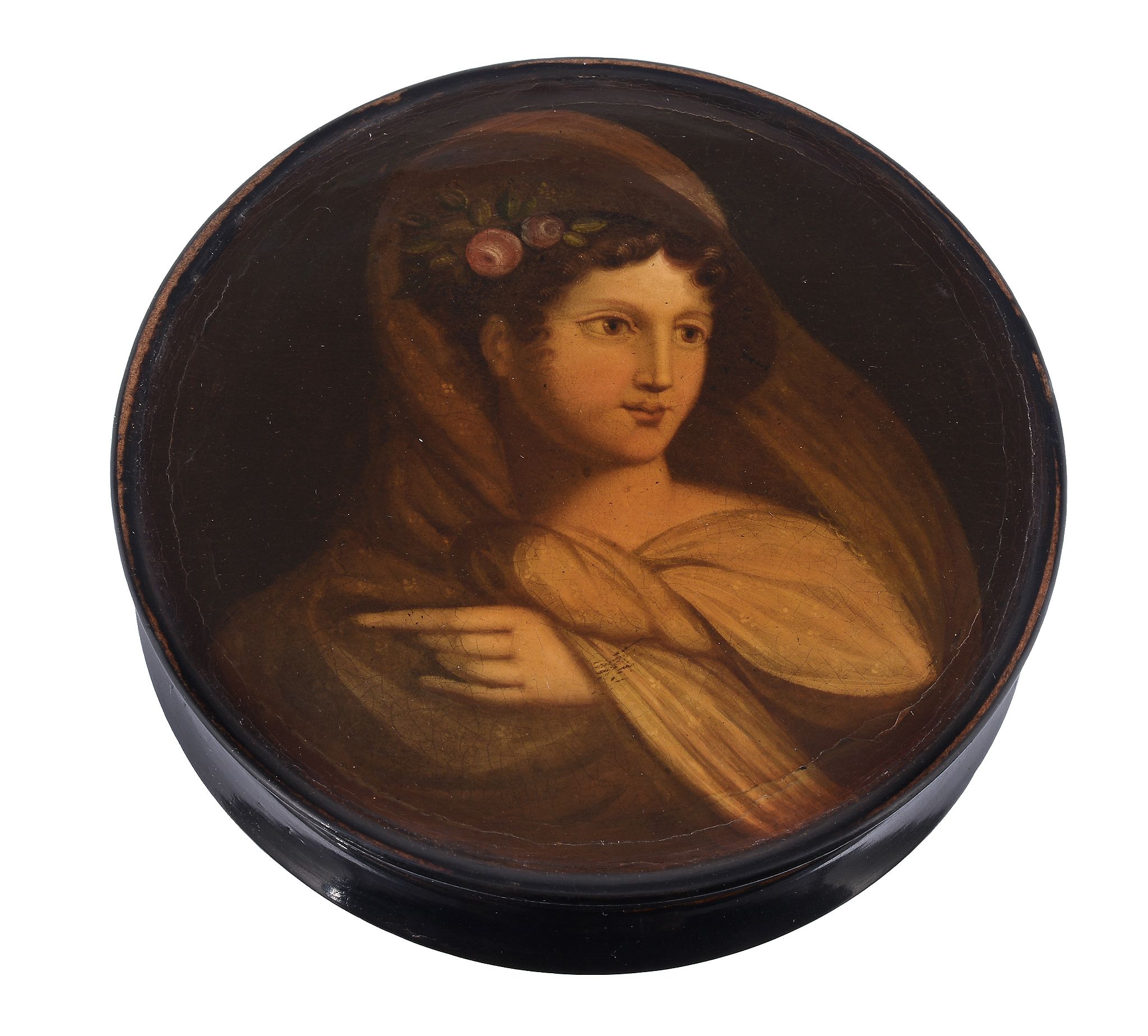 A papier mache circular snuff box, circa 1820  A papier mache circular snuff box,   circa 1820,