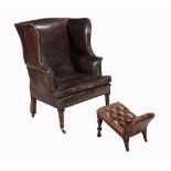A Regency mahogany and studded leather upholstered wing armchair , circa 1815  A Regency mahogany