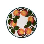 A Wemyss plate, circa 1900, painted with six apples on branches, impressed  A Wemyss plate, circa