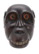 A George III mahogany novelty snuff box, circa 1800, in the form of a great ape  A George III