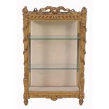 A late Victorian giltwood hanging display cabinet, circa 1890  A late Victorian giltwood hanging