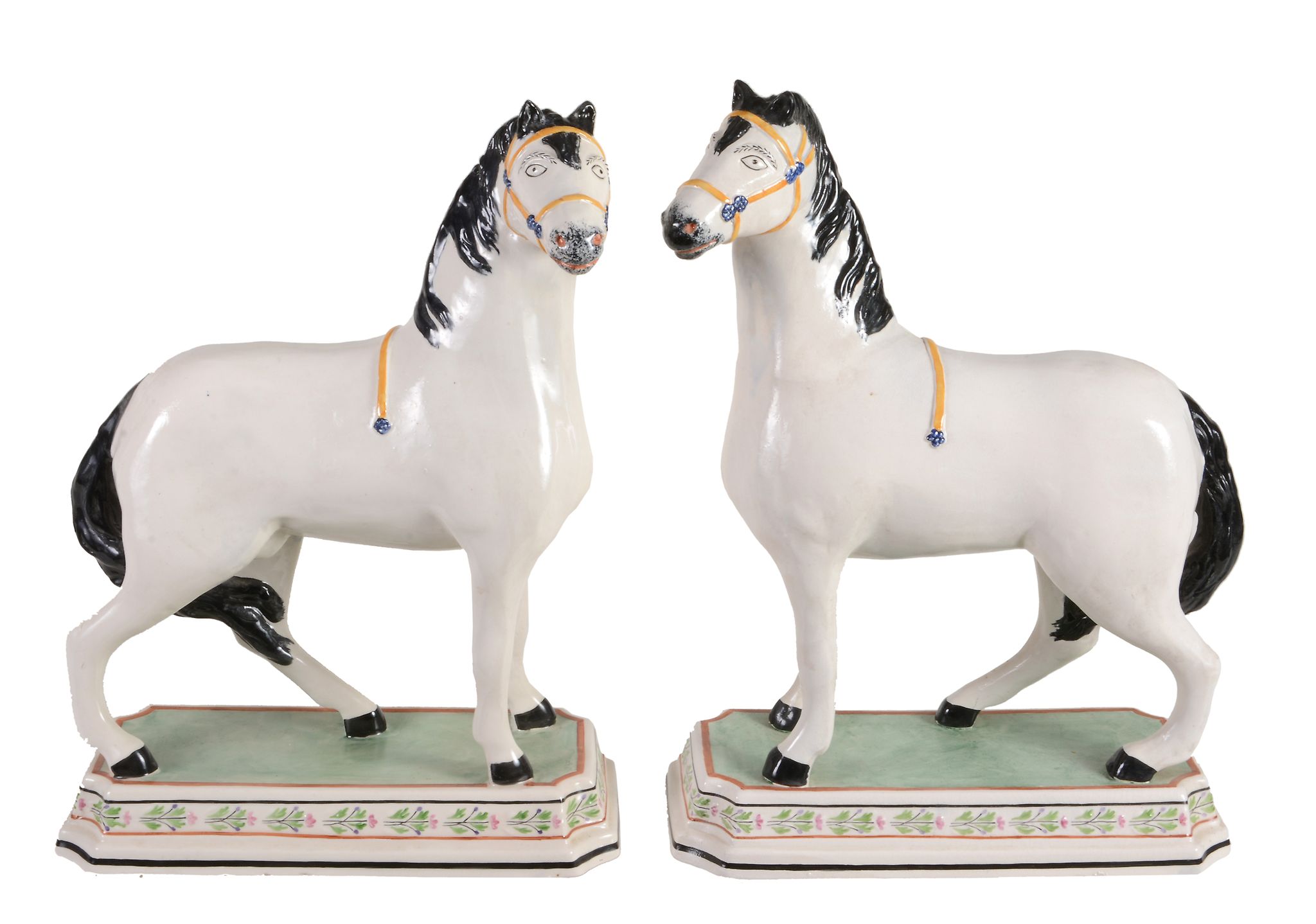 A pair of modern Staffordshire pottery reproductions of early 19th century...  A pair of modern