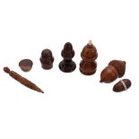 A collection of coquilla nut and other small treen, various 19th century dates  A collection of