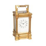 A French gilt brass carriage clock with push-button repeat Unsigned