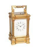 A French gilt brass carriage clock with push-button repeat Unsigned