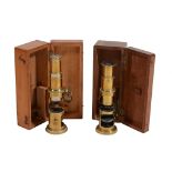Two similar Victorian lacquered brass field microscopes Both unsigned