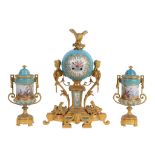 A fine French Sevres style porcelain mounted ormolu mantel clock garniture