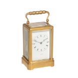 A French gilt brass carriage clock in one-piece case The dial signed for Bright