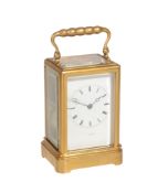 A French gilt brass carriage clock in one-piece case The dial signed for Bright