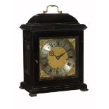 A William III style ebonised quarter-chiming table clock The movement signed...