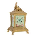 A fine French small porcelain panel inset ormolu mantel clock Martin