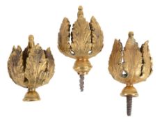 A rare gilt brass group of three 'tulip' clock finials Anomynous