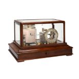 A mahogany barograph with barometer dial Retailed by Harrods Limited, London