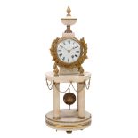 A Regency gilt brass mounted white marble small mantel timepiece in the form...