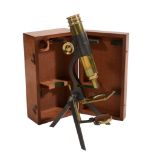 A late Victorian lacquered and patinated brass portable monocular microscope...