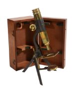 A late Victorian lacquered and patinated brass portable monocular microscope...
