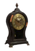 An unusual George II brass mounted ebonised balloon-shaped table timepiece John Hallifax, London,