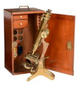 A late Victorian brass binocular microscope Dring and Fage, London