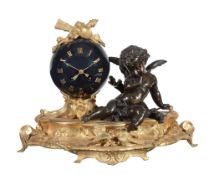A French ormolu and patinated bronze figural mantel clock The movement with...