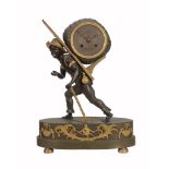 A rare French Empire ormolu and patinated bronze figural mantel clock