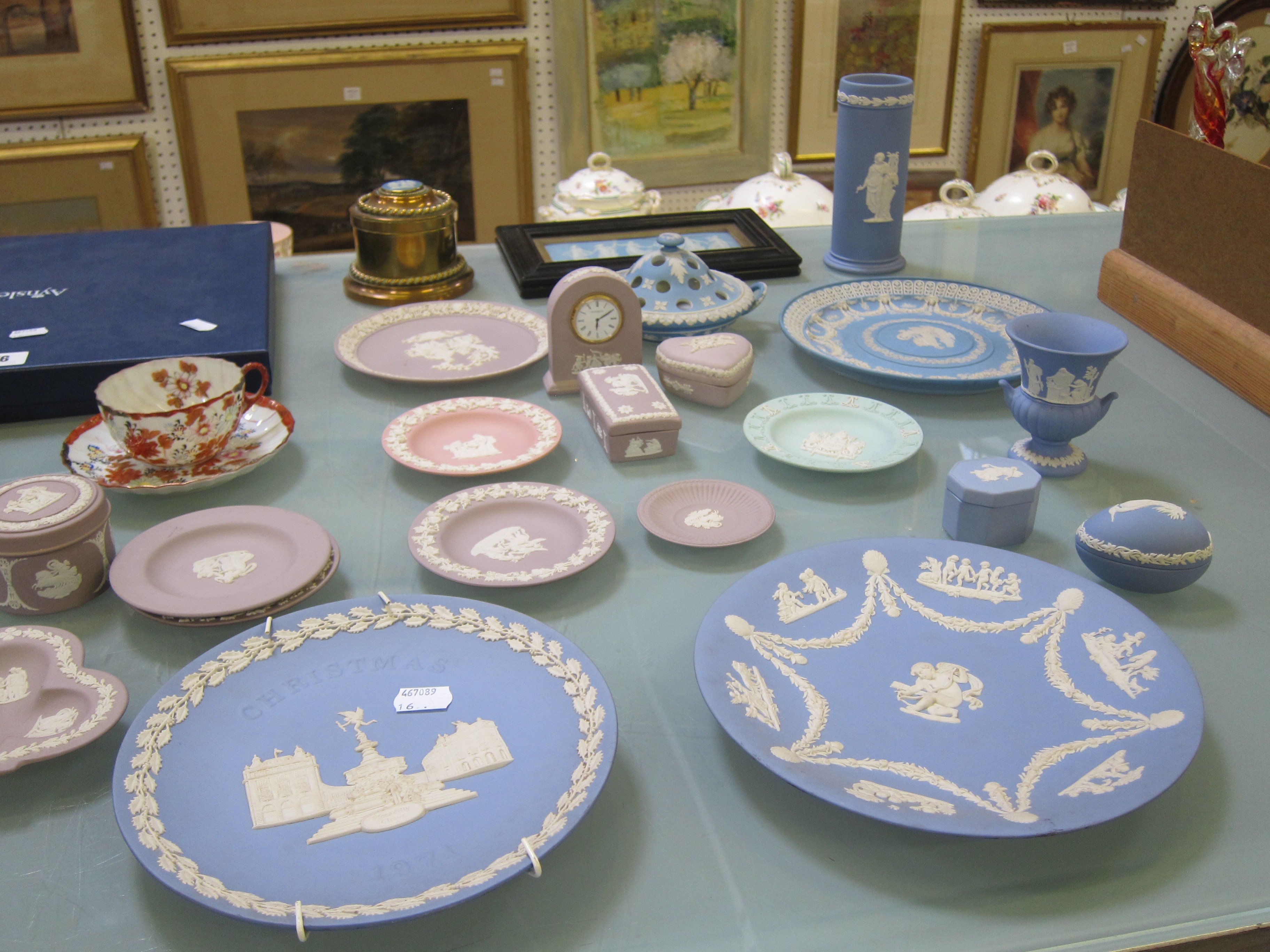 A quantity of Wedgwood jasperware, to include purple clock, blue egg, miniature campana urn,