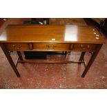 A mahogany three drawer side table in George III style, of recent manufacture, rectangular top above