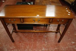 A mahogany three drawer side table in George III style, of recent manufacture, rectangular top above