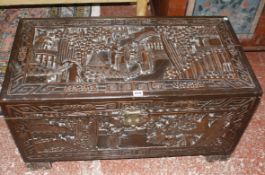 A Chinese carved hardwood trunk