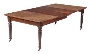 A late Victorian mahogany dining table, circa 1890, made by Selbat, with two extra leaves, the top
