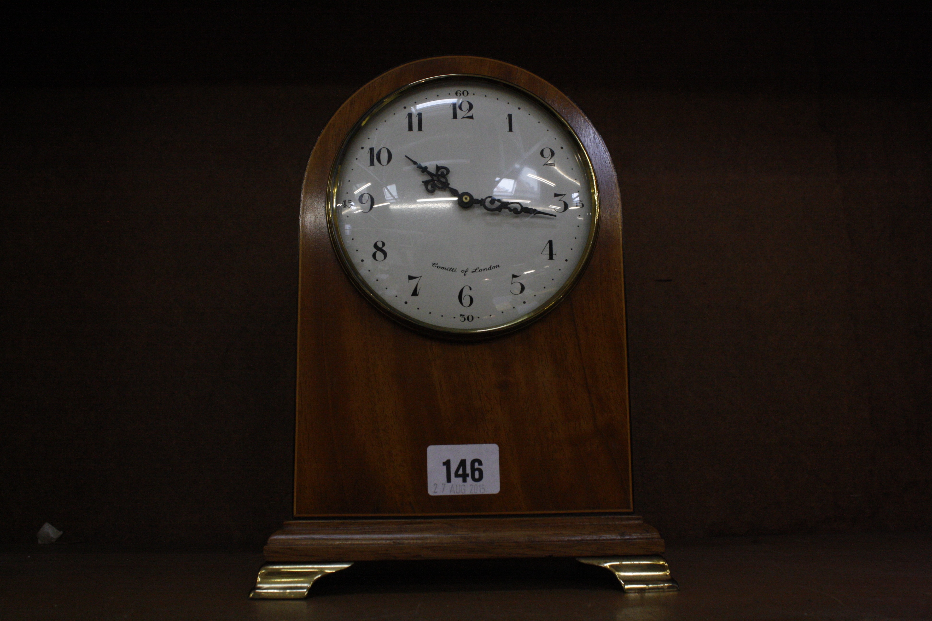 A Comitti of London mahogany mantel clock, 25cm high