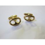 A pair of 9ct gold cufflinks marked Gucci, 14g approx.