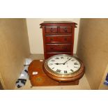 An oak drop dial wall clock, B.R.W. and a mahogany small table chest of drawers (2)