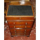 A 19th century Anglo-Indian rosewood Davenport, the sliding and formerly swivel top with a hinged