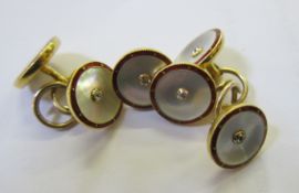 A pair of 18ct gold, diamond, mother of pearl and enamel cufflinks and a spare pair of ends