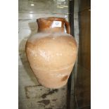 An early terracotta jug, 31cm high approx. Best Bid