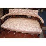 An Edwardian upholstered and mahogany settee,140cm.