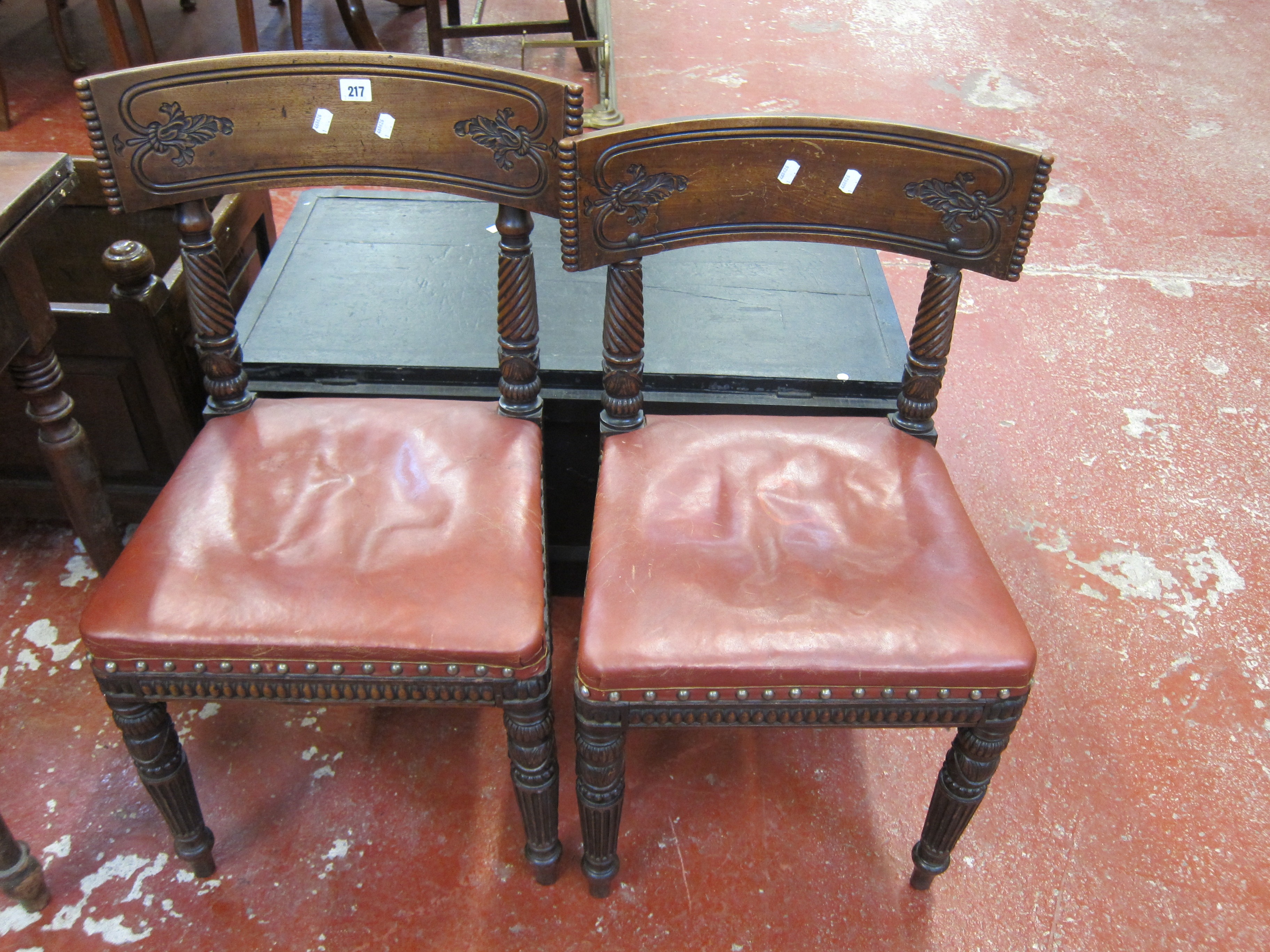 A near pair of Regency mahogany dining chairs