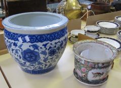 A modern blue and white fish bowl and a late Cantonese jardinière and stand