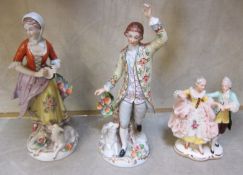 A pair of Derby figures, male and female, with lambs, 21cm high approx. and a Dresden figure group