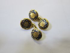 A pair of 18ct gold and blue enamel cufflinks, engraved decoration