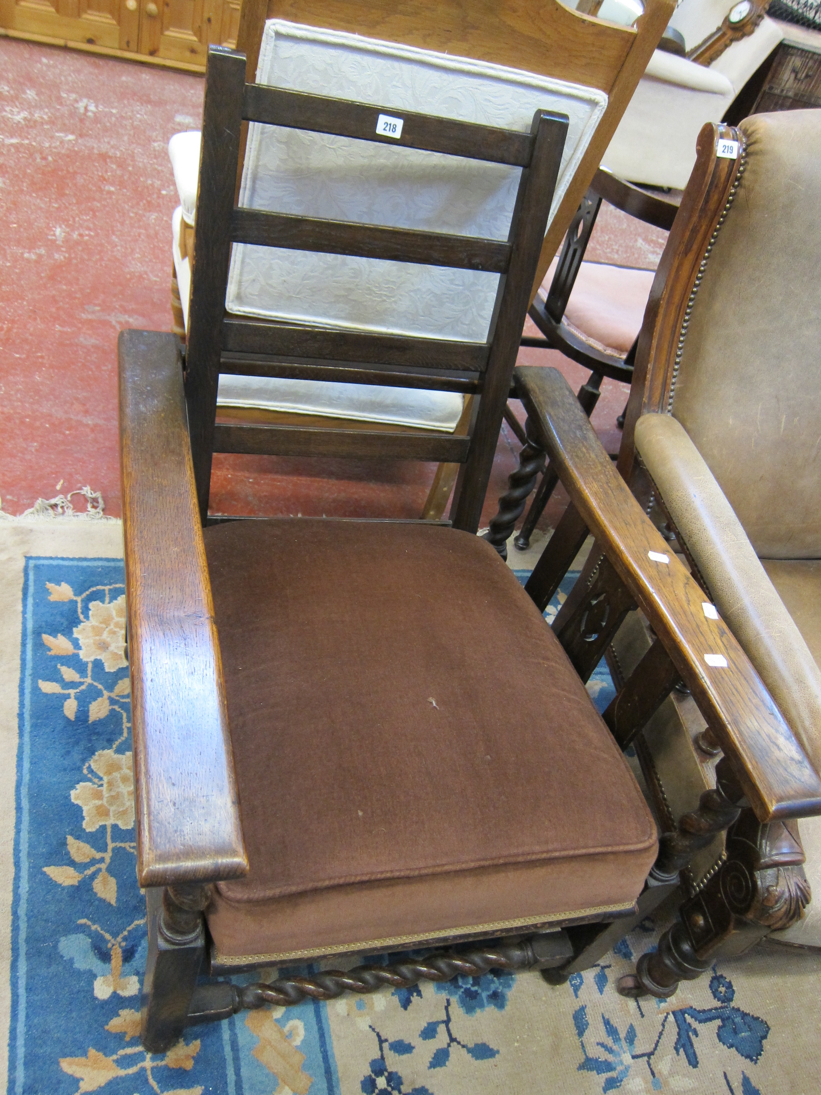 * A 1930's oak reclining chair.