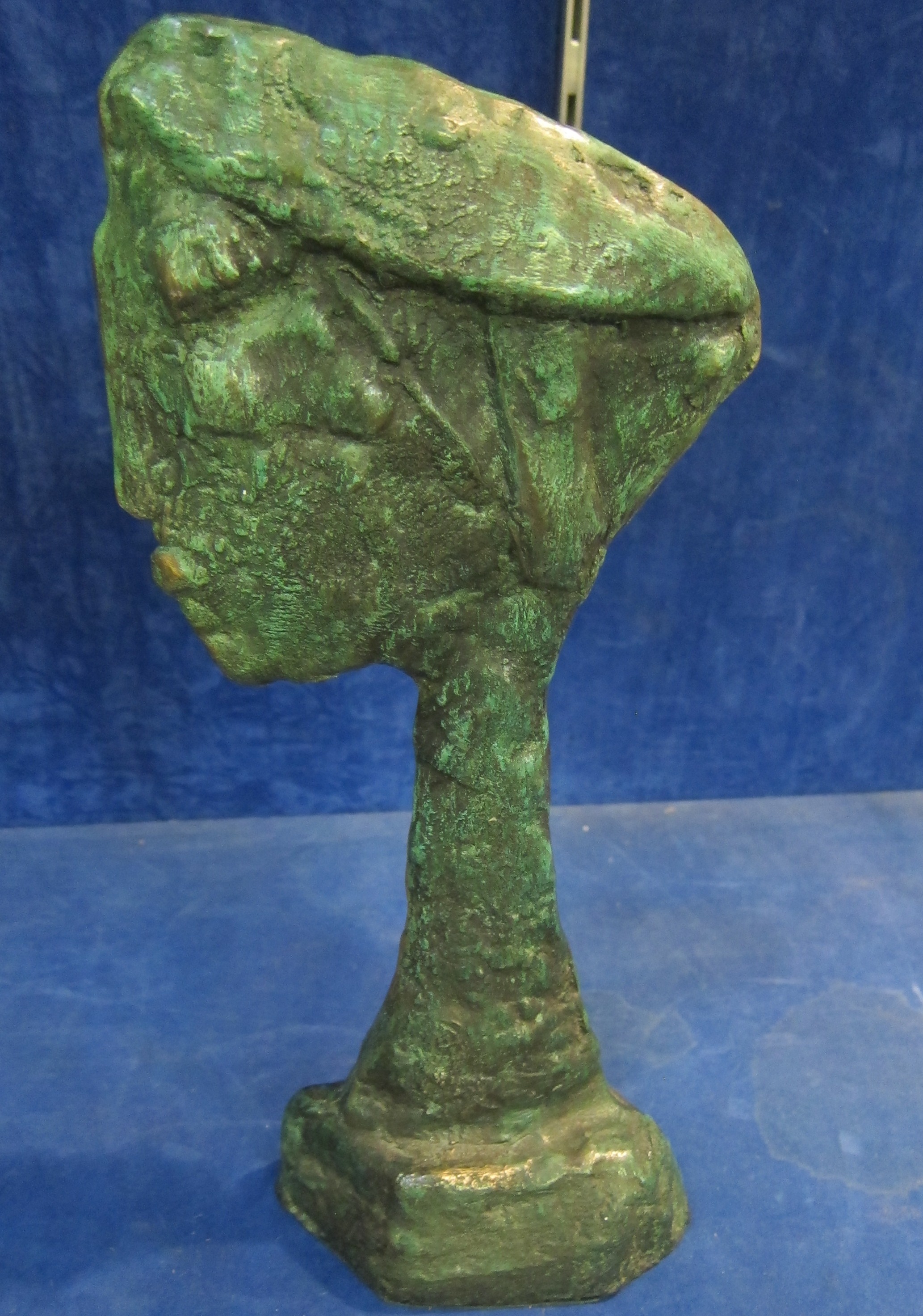 English School (20th Century) bronze study of a head, unsigned, 30cm high approx.