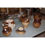 Doulton Lambeth stoneware jugs, tri-handled mugs and other items -7